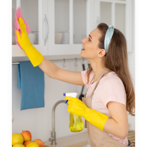 lovely-millennial-housemaid-wiping-kitchen-cabinet-Z4565XL.png